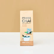 Prana Chai Decaf Blend packaging on a beige background